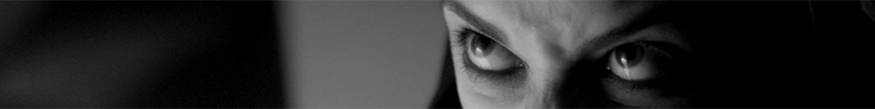 Movie bar for A Girl Walks Home Alone at Night with the eyes of Sheila Vand.