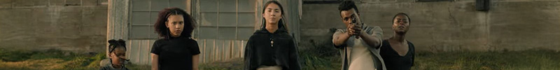 A small, thin image of the top halves of the cast of 40 Acres. 