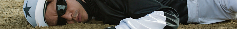 Daniel Giménez Cacho as Remo laying in the dirt in Kill the Jockey.