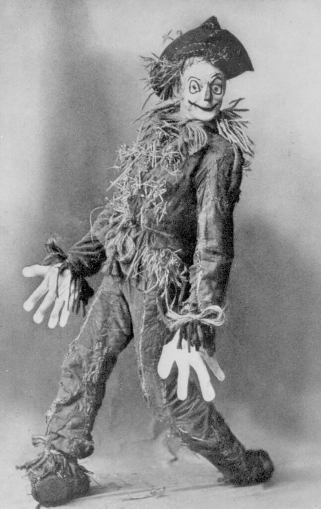 Black and White photo of Fred Stone dressed as the Scarecrow from the stage production of The Wizard of Oz.