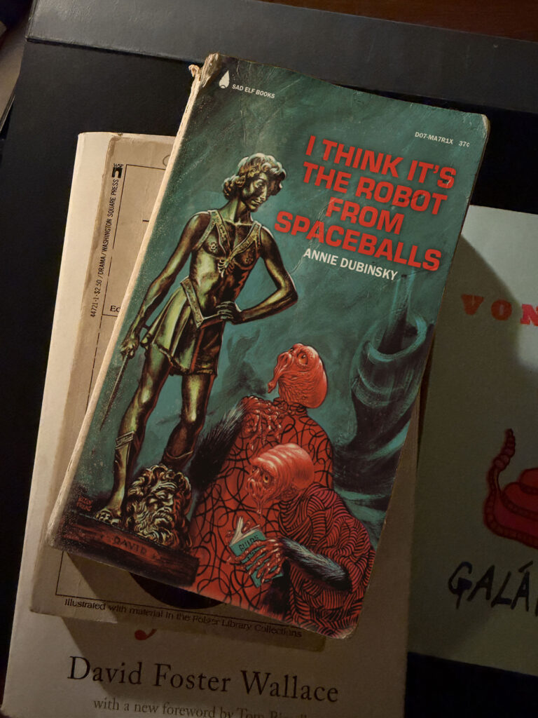 A paperback book titled I Think It's the Robot from Spaceballs.
