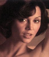Victoria Principal is not wearing very much in the rest of this picture.